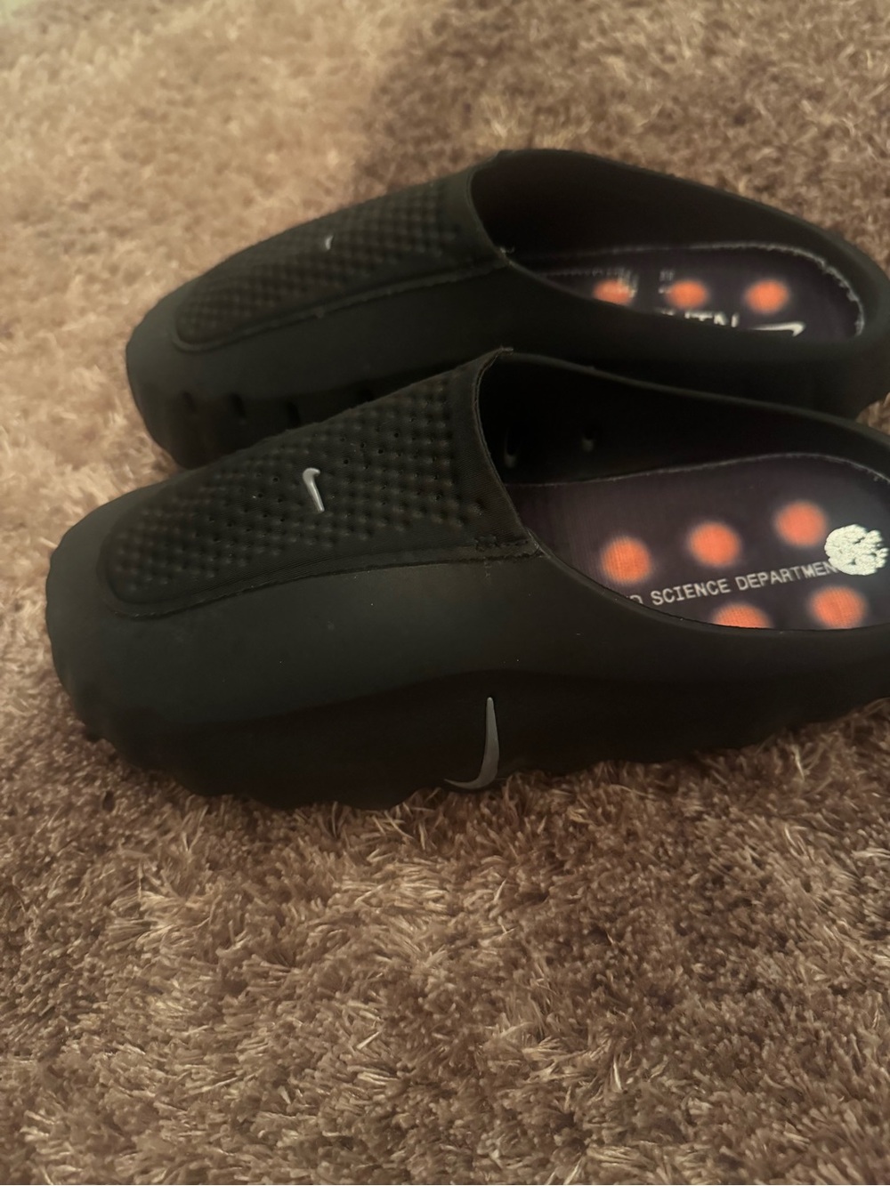 Nike Mind Black Slip-On Loafers with Orange Insole Accents